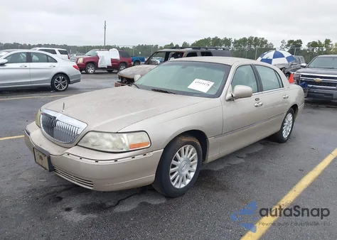2004 Lincoln Town Car Ultimate из США, поврежденный, VIN 1LNHM83W44Y674497